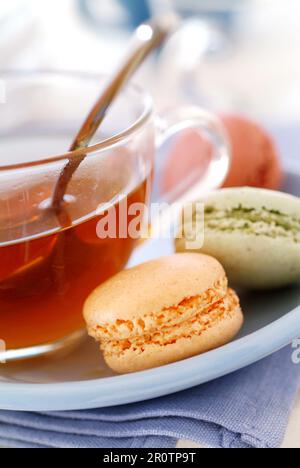 Macaroons and cup of tea Stock Photo