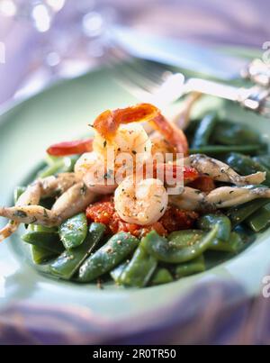 Shrimps and frog legs Stock Photo