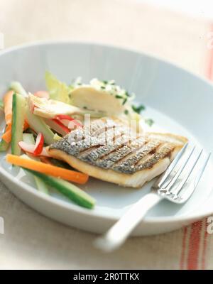 Grilled pike-perch fillet with vegetables Stock Photo