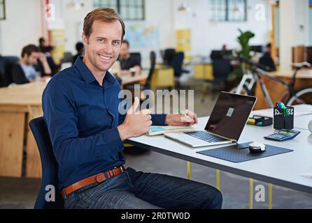 Developing tomorrows tech today. a designer at their workstation in an office. Stock Photo