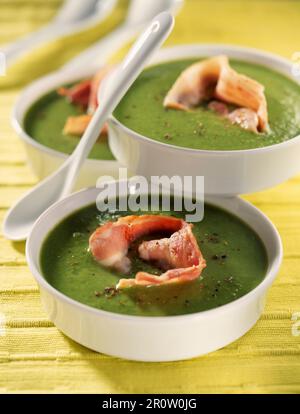 creamed pea soup with bacon Stock Photo