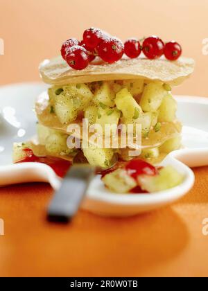 Pineapple and redcurrant mille-feuille Stock Photo