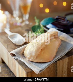 Towel-wrapped whole raw foie gras Stock Photo