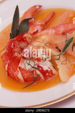 Fried Breton lobster with sage and grapefruit Stock Photo