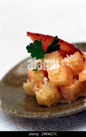 French toast bites with bacon and Parmesan as an appetiser Stock Photo