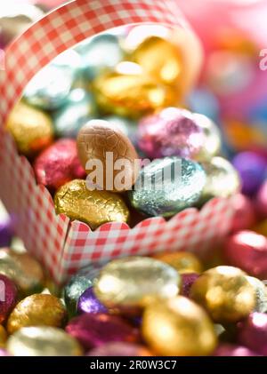 Basket of chocolate Easter eggs Stock Photo
