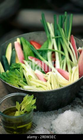 Cooking pot full of raw vegetables Stock Photo