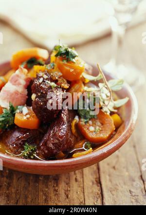 Ostrich,bacon and carrot stew Stock Photo