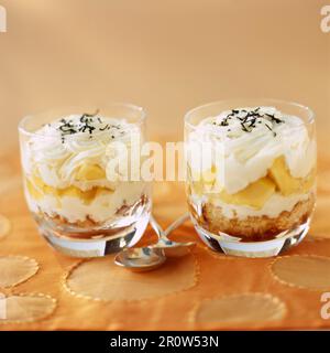 Yellow peach and tea-flavored Tiramisus Stock Photo