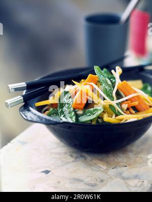 Vegetables cooked in a wok Stock Photo