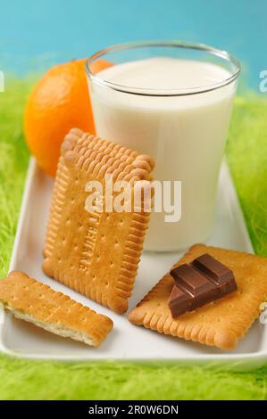 Rich tea biscuits and a glass of milk Stock Photo