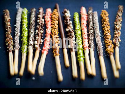 Different flavored chocolate Mikados Stock Photo