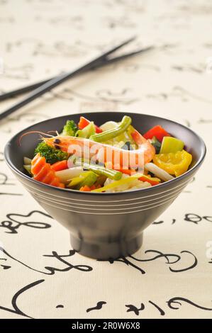 Pan-fried vegetables and shrimps Stock Photo