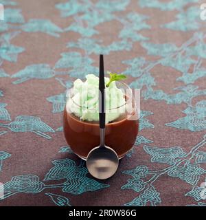 Chocolate cream dessert with mint mousse Stock Photo