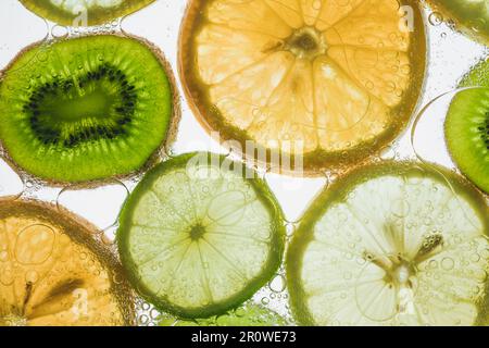 Citrus slices floating in water Stock Photo