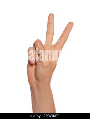 Man showing victory gesture on white background, closeup Stock Photo