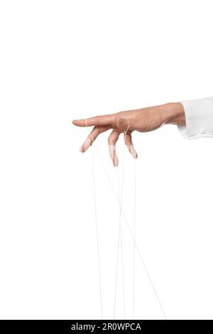 Woman pulling strings of puppet on white background, closeup Stock Photo