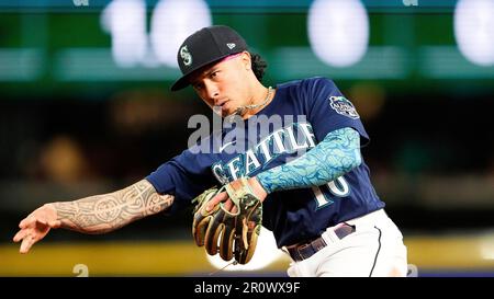 Seattle Mariners' Kolten Wong follows through during a baseball game  against the Washington Nationals, Tuesday, June 27, 2023, in Seattle. (AP  Photo/Lindsey Wasson Stock Photo - Alamy