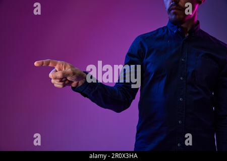 Businessman touching virtual computer screen, working with innovative digital system. Cyberspace, innovations data science Stock Photo