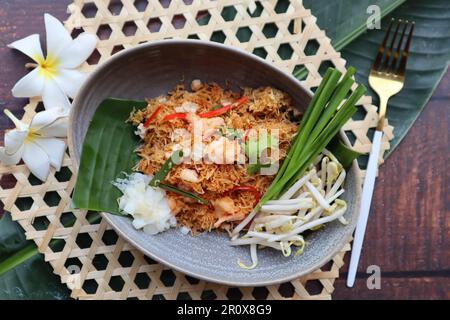 Mee Krob - Thai appetizer of  sweet and sour crispy Rice noodles, shrimp, and vegetable at top view of  Authentic Thai food Stock Photo