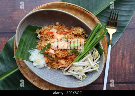 Mee Krob - Thai appetizer of  sweet and sour crispy Rice noodles, shrimp, and vegetable at top view of  Authentic Thai food Stock Photo