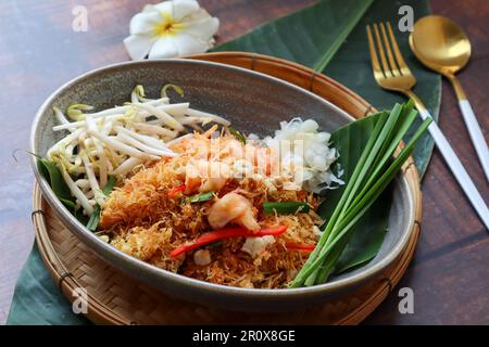 Mee Krob - Thai appetizer of  sweet and sour crispy Rice noodles, shrimp, and vegetable at close up view of  Authentic Thai food Stock Photo