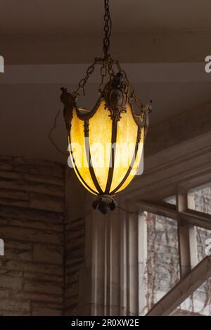 Toronto, ON, Canada - December 20, 2022: Retro chandelier in Casa Loma castle in Toronto. The place is part of the Canadian National Heritage and a to Stock Photo