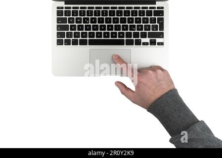 top down view of man using touchpad on laptop computer isolated on white background Stock Photo