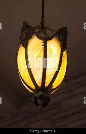 Toronto, ON, Canada - December 20, 2022: Retro chandelier in Casa Loma castle in Toronto. The place is part of the Canadian National Heritage and a to Stock Photo