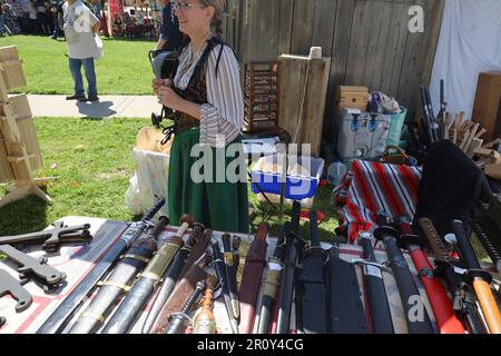 4-15-2023: Visalia, California: Weapons and vendors in period costumes