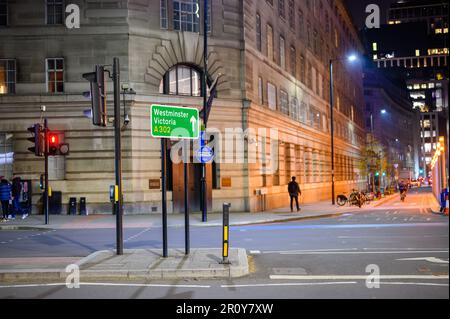 LONDON - April 21, 2023: Discover the iconic landmarks of London with the illuminated Westminster and Victoria road sign outside County Hall on Southb Stock Photo