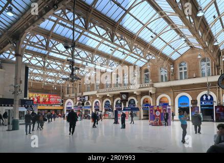 Main concourse at Charing Cross railway station, London, UK. Shows Victorian glazed roof. Stock Photo