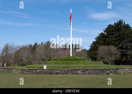 These grassy steps are Tynwald Hill situated in the hamlet of St John's on the Isle of Man. Tynwald Day is held annually here to pass new laws. Stock Photo