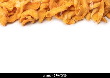 Dried melon slices isolated on a white background. Dried fruit. Stock Photo