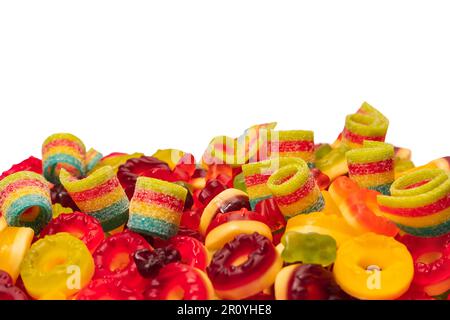 Assorted colorful gummy candies. Top view. Jelly donuts. Jelly bears. Isolated on a white background. Stock Photo