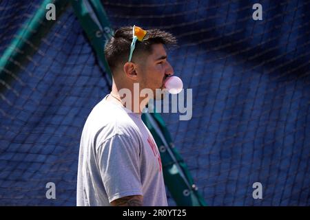 Philadelphia Phillies' Nick Castellanos blows a bubble as he walks to the  dugout during a baseball game against the Cincinnati Reds in Cincinnati,  Friday, April 14, 2023. The Phillies won 8-3. (AP