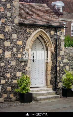 Door to the Choir House in the grounds of Canterbury cathedral in the city of Canterbury, Kent, UK Stock Photo