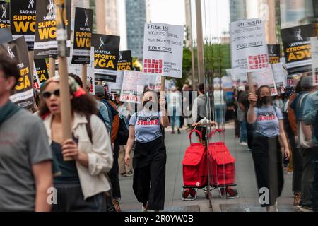 Members of the Writers Guild of America East and other union supporters picket outside the HBO/Amazon offices in the Hudson Yards neighborhood in New York on Wednesday, May 10, 2023. The writers want a larger share of streaming revenue as well as mandatory staffing and duration of employment. The last strike in November 2007 lasted 100 days. (© Richard B. Levine) Stock Photo