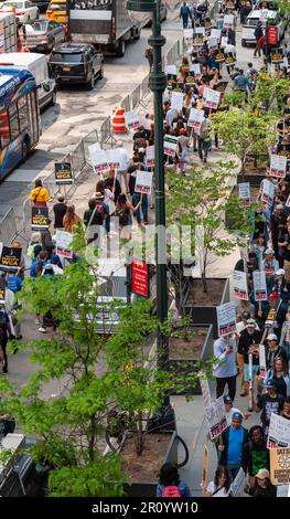 Members of the Writers Guild of America East and other union supporters picket outside the HBO/Amazon offices in the Hudson Yards neighborhood in New York on Wednesday, May 10, 2023. The writers want a larger share of streaming revenue as well as mandatory staffing and duration of employment. The last strike in November 2007 lasted 100 days. (© Richard B. Levine) Stock Photo