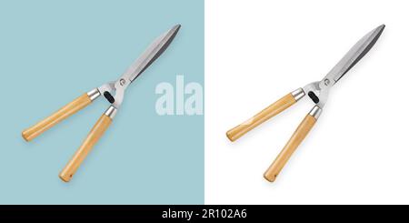 steel gardening scissors for pruning the hedge with wooden grip, top view isolated on white and light blue background, spring time concept for gardeni Stock Photo