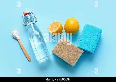 Lemons, washing soda, bottle of vinegar and glass Stock Photo by  ©Syda_Productions 375407254