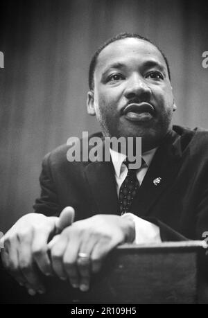 TITLE:  Martin Luther King press conference..CALL NUMBER:  LC-U9- 11696-9A [P&P]..REPRODUCTION NUMBER:  LC-DIG-ppmsc-01269 (digital file from original negative).No known restrictions on publication...SUMMARY:  Photograph shows head-and-shoulders portrait of King leaning on a lectern...MEDIUM:  1 negative : film...CREATED/PUBLISHED:  1964 Mar. 26...CREATOR:..Trikosko, Marion S., photographer...NOTES:..Title from contact sheet folder caption...U.S. News & World Report Magazine Photograph Collection...Contact sheet available for reference purposes: USN&WR COLL - Job no. 11696, frame 9A...SUBJECTS Stock Photo