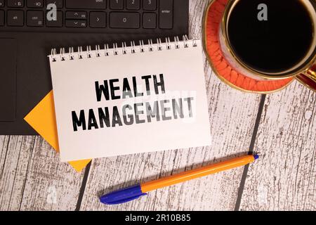 Wealth management is shown using a text and pictures of dollars Stock Photo