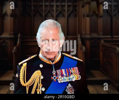 KING CHARLES III PORTRAIT UNIFORM CHAPEL pensive reflective portrait head and shoulders of King Charles III in full RAF ceremonial uniform, with ecclesiastical carved wooden gothic chapel background. Windsor Berkshire UK. The new Sovereign and Monarch of the United Kingdom Stock Photo