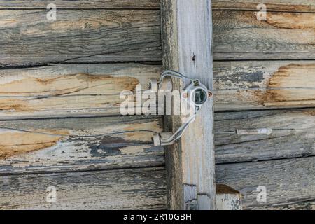 Early 1900s tube and knob electrial wiring at the train station at the Nevada ghost town of Rhyolite. Stock Photo