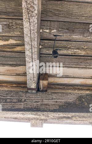 Early 1900s tube and knob electrial wiring at the train station at the Nevada ghost town of Rhyolite. Stock Photo