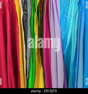 Samples of vivid colorful fabrics in different colors closeup Stock Photo