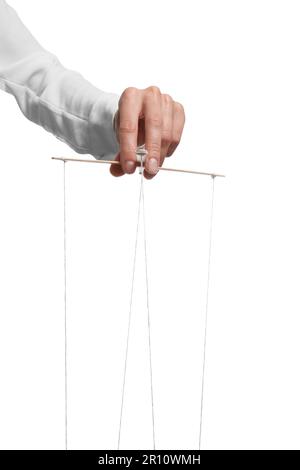 Woman pulling strings of puppet on white background, closeup Stock Photo