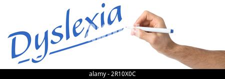 Man writing word Dyslexia on white background, closeup. Banner design Stock Photo