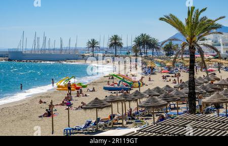 MARBELLA, ANDALUCIA/SPAIN - MAY 4 : View of the beach at Marbella Spain on May 4, 2014. Unidentified people Stock Photo